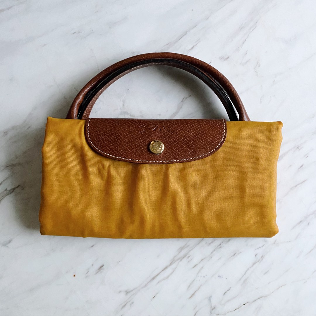 Longchamp Le Pliage Large Travel Bag in mustard, Luxury, Bags & Wallets
