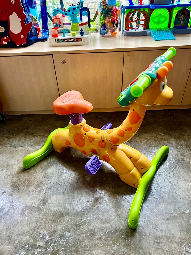 Vtech ride on hot sale giraffe bike