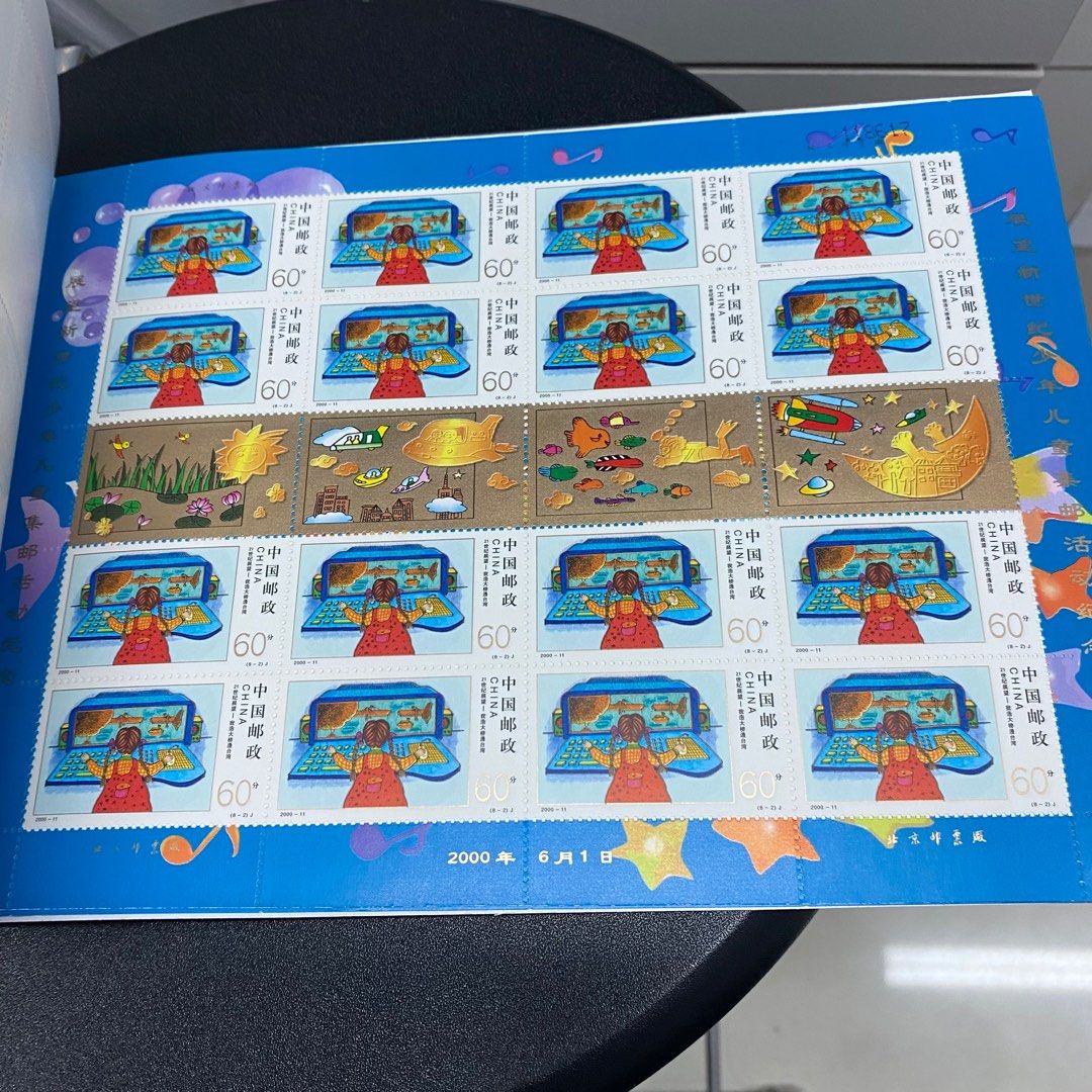 展望新世紀少年兒童集郵活動21世紀展望中國郵冊品相如圖中國郵票郵冊