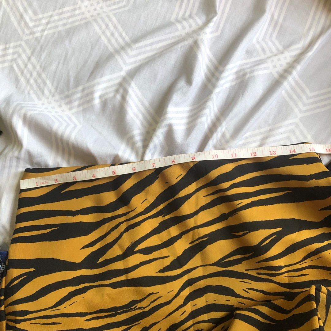 Animal Print Midi Skirt (Category: Skirts) located in Cavite. Submitted by daphnesea (Listing ID 1196884624, Image 3). Description: Tag is S but I think fits S-XL. Stretchy material Check out my listing for free items with any purchase.