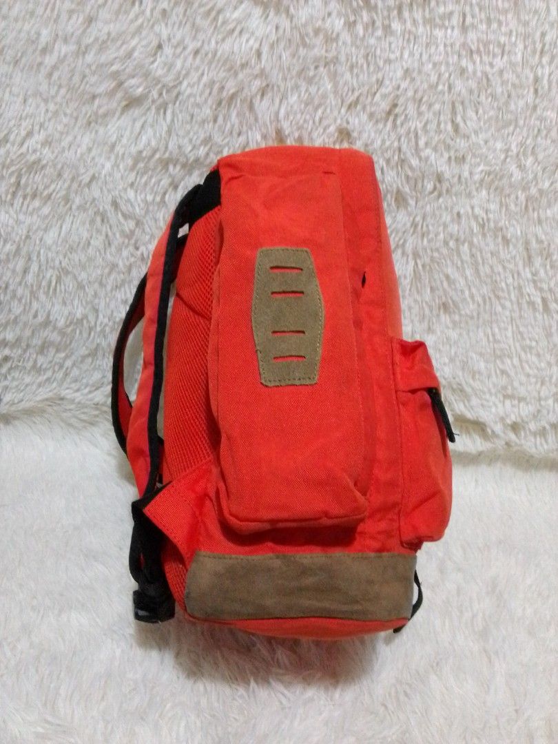 Converse orange backpack (Category: Backpacks) located in Cainta. Submitted by janilen (Listing ID 1196969236, Image 3). Description: 10"x15" with flaws need wash see pic for details. preloved from Korea manage your expectations.