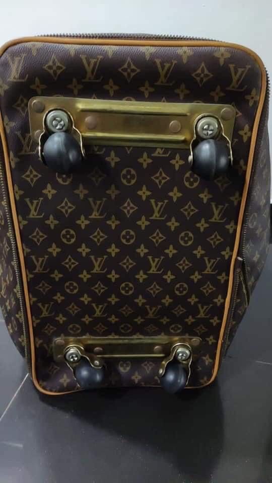 Louis vuitton bag with wheels hot sale