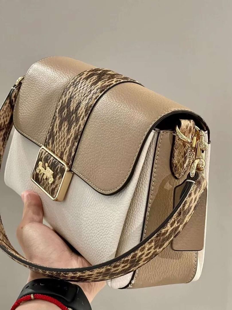 Coach discount snakeskin clutch
