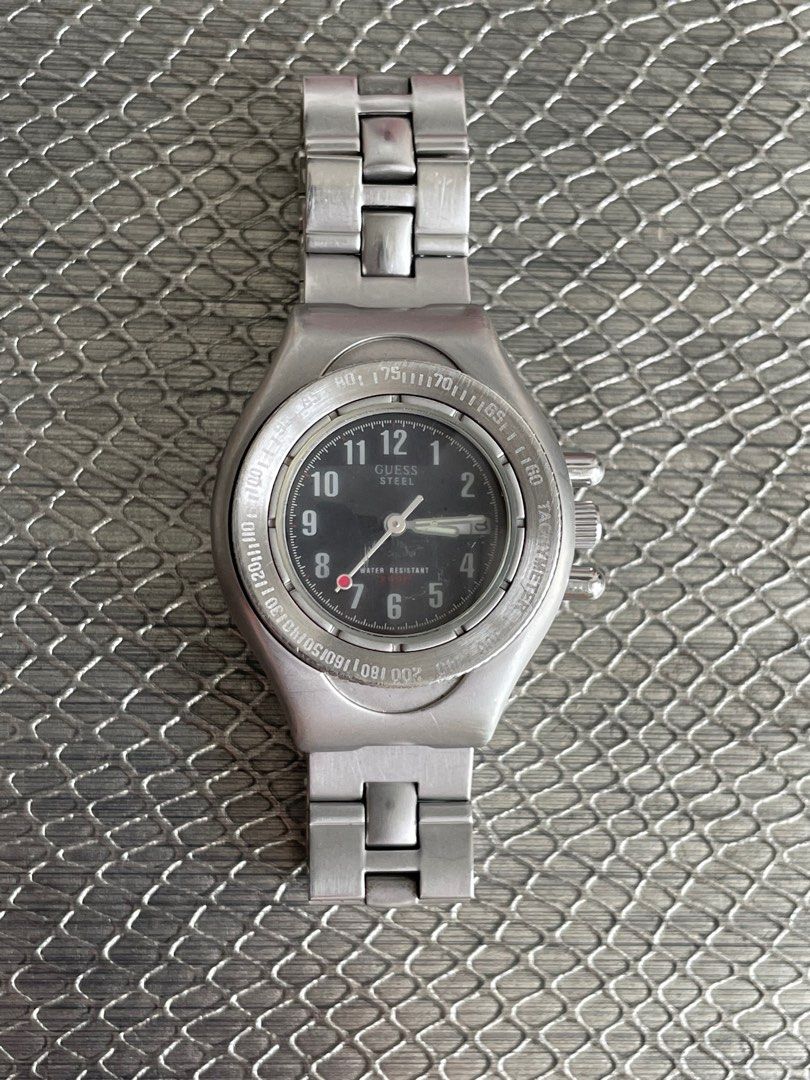 White and gold nixon watch online