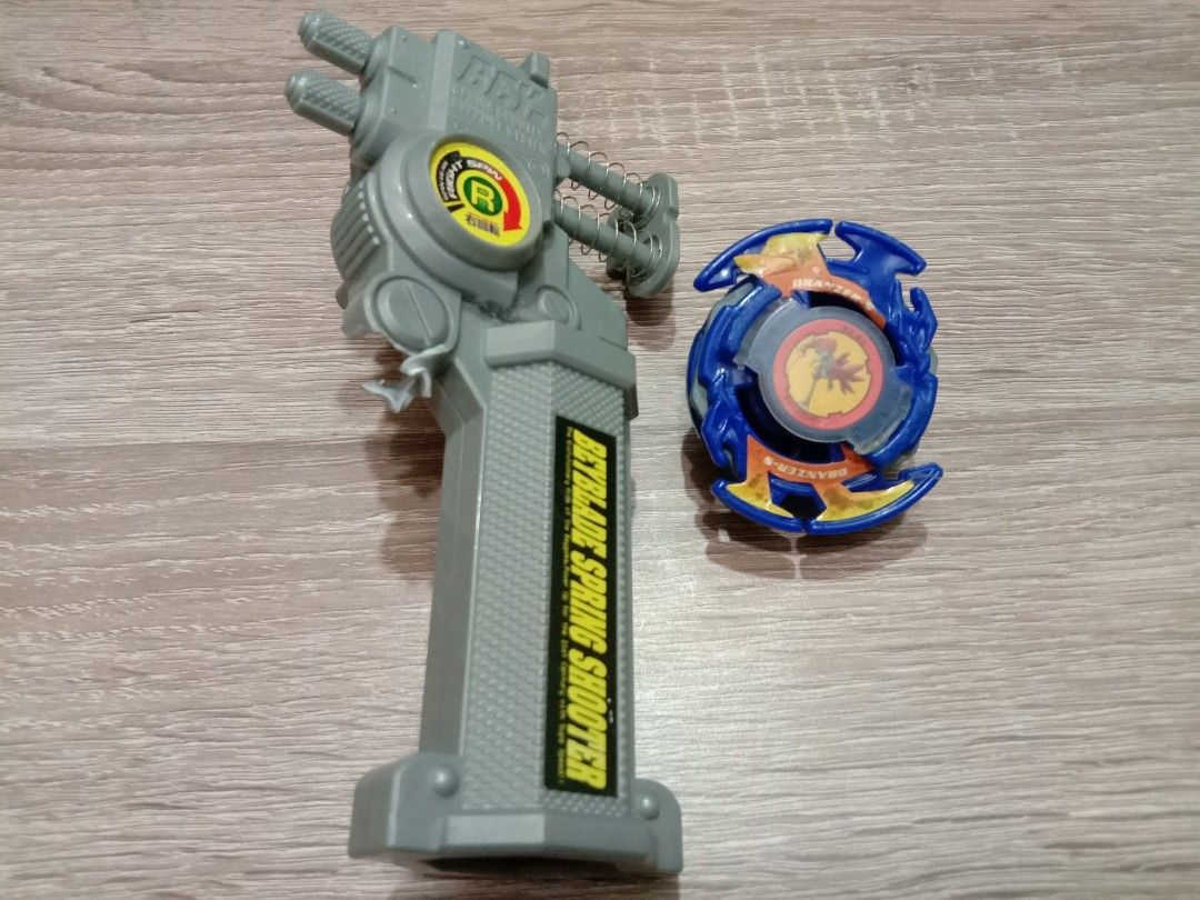 Beyblade Plastic Gen Dranzer s Bootleg and spring launcher, Hobbies