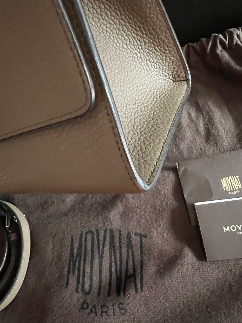 Moynat Rejane MM (Category: Luxury Bags & Wallets) located in Muntinlupa City. Submitted by bagstagram (Listing ID 1197111988, Image 3). Description: The Réjane – the debut handbag to be named after a star, Gabrielle Réjane. First launched in 1903, its clean yet feminine lines evoke detailing from historical Moynat trunks. Crafted using a complex technique known as bords francs in which the leather edges of the piece are all exposed once, each ba