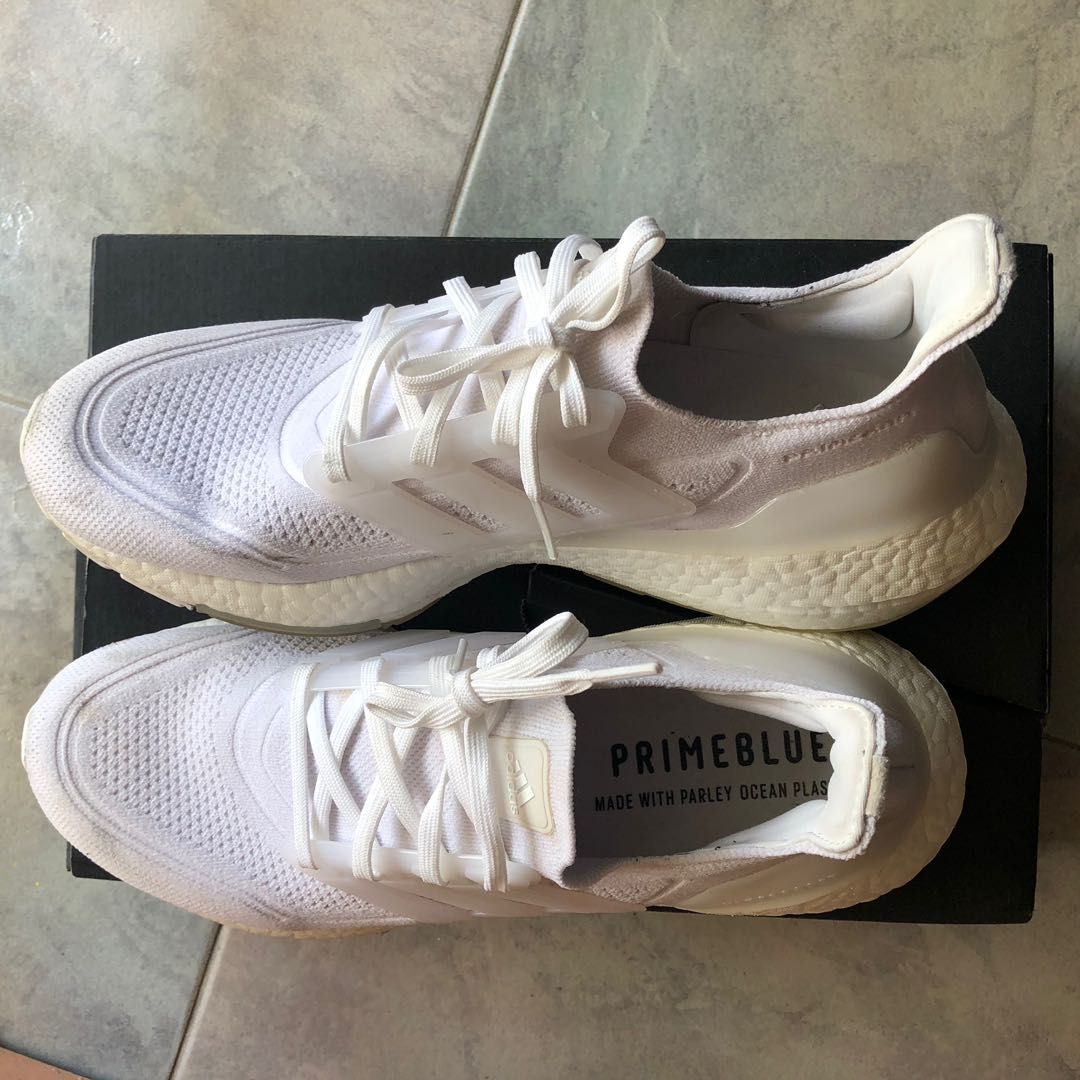 ultraboost 21 triple white on feet