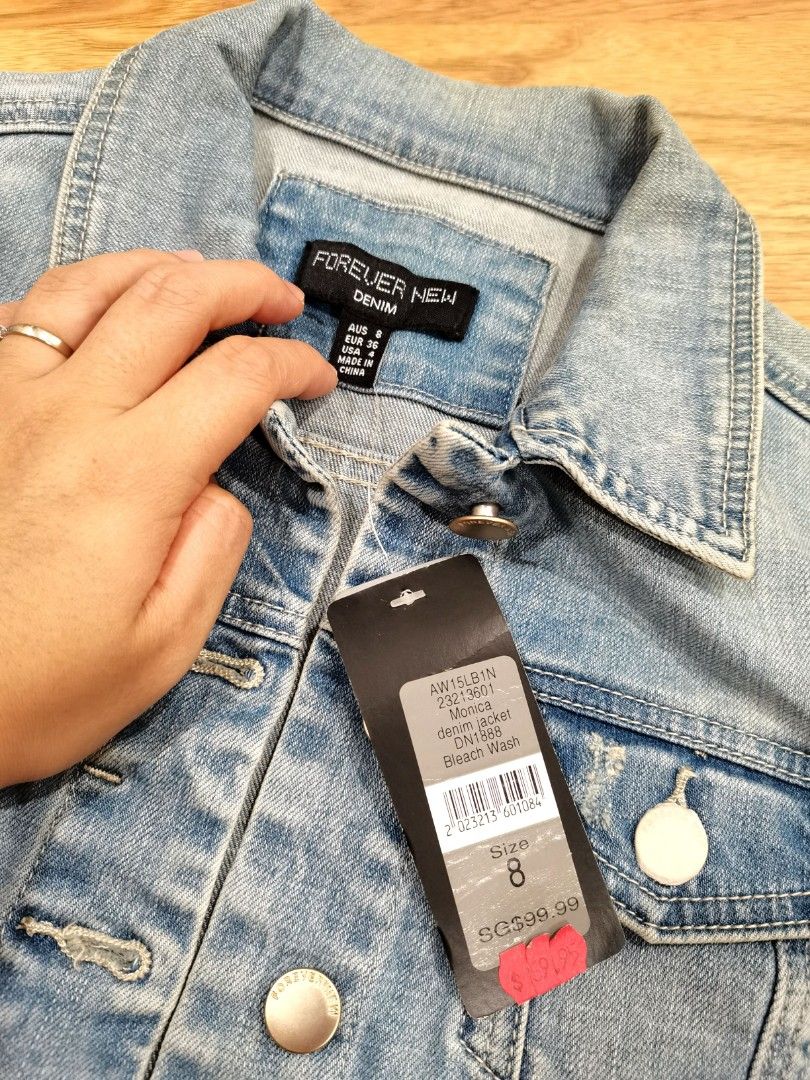 Brand new FOREVER NEW denim jeans jacket. Blue. Long sleeves. Collared Button down. With tag. From Australia