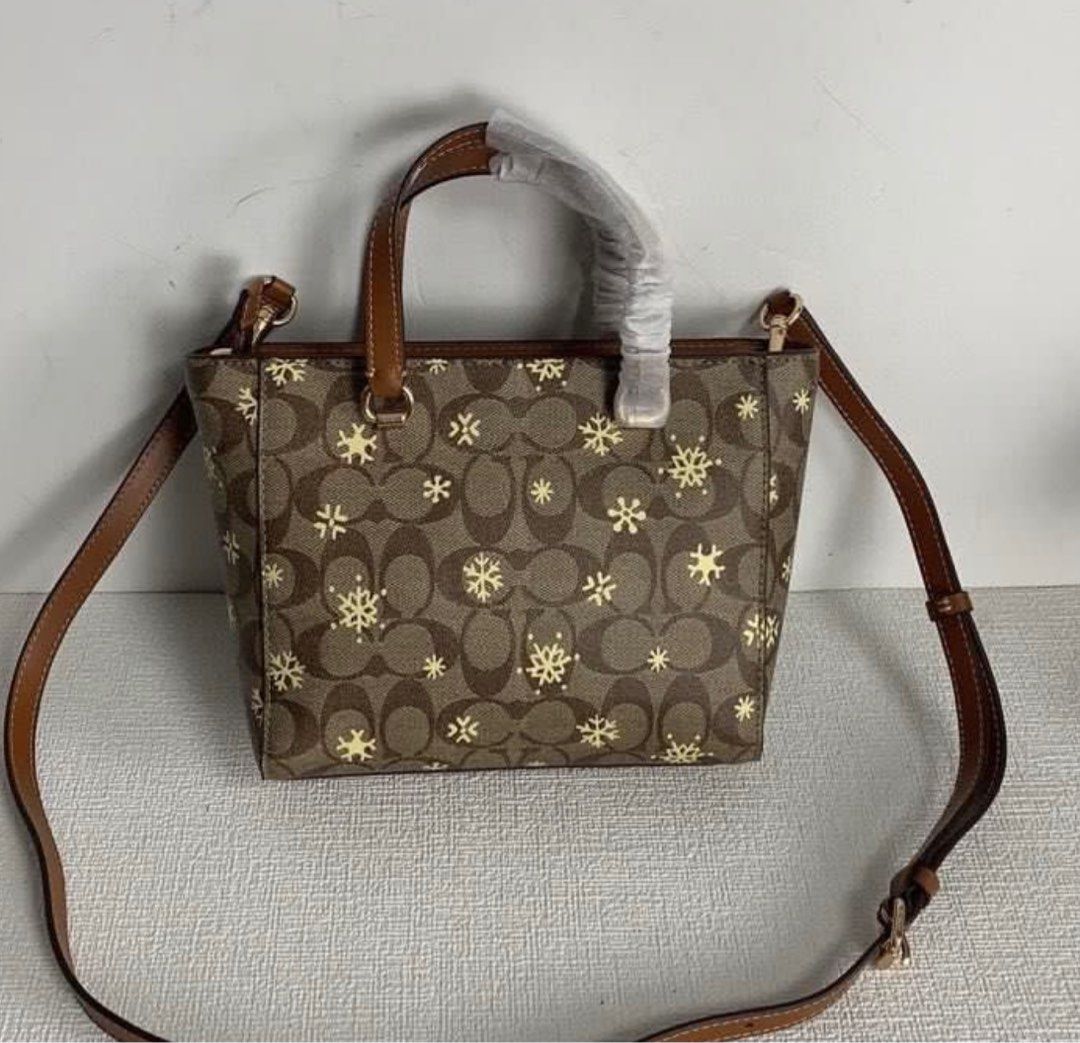 Snowflake coach on sale purse