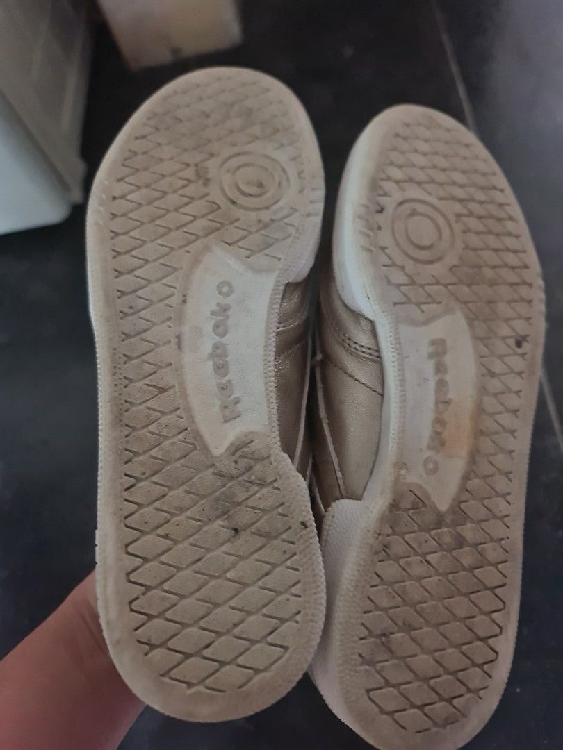 Gold reebok shoes top