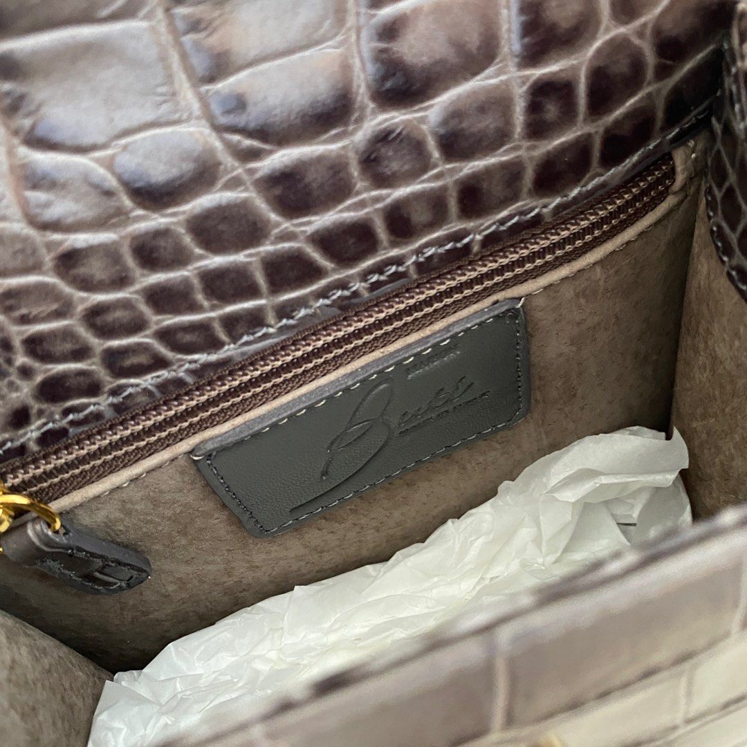 Italy Calfskin Bamboo Buti Minny Mini Cocco (Category: Bags & Wallets) located in Singapore. Submitted by toysmadness (Listing ID 1197356110, Image 2). Description: Handmade in Italy https://shop.butipelletterie.com calfskin bag with bamboo handle. Comes with a sling. Free shipping.
