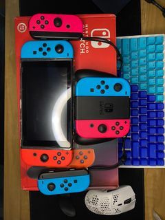 Nintendo Switch V2 with 3 pair of joycons