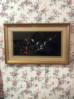 Oriental artwork in wood and glass shadow frame