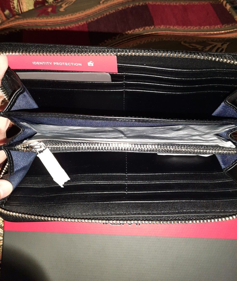 TUMI Sinclair zip around continental Women s Fashion Bags