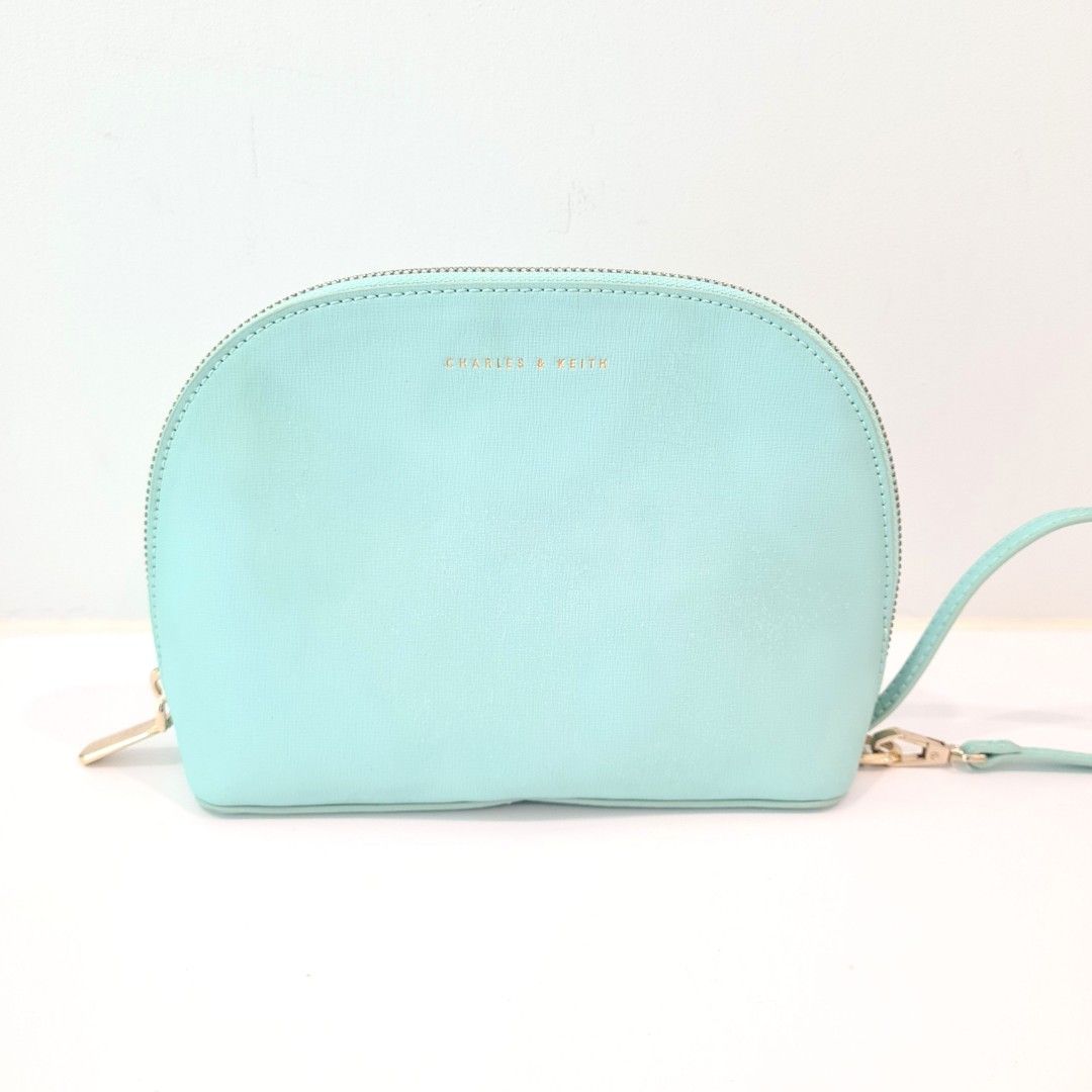 pastel green clutch bag