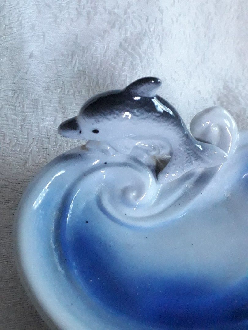 Dolphin Design Ceramic Soap Dish / Jewelry Tray (Category: Bathroom & Kitchen Fixtures) located in Quezon City. Submitted by jojoleen28 (Listing ID 1197554328, Image 2). Description: Add some accents to your home. Can be used as soap dish or as container for jewelry or for simple home decor. Hairline on bottom and slight scratches as seen in last photos. 14cm x 10cm x 6.5cm.