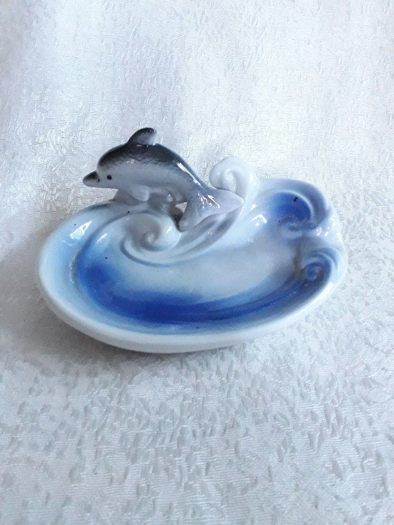 Dolphin Design Ceramic Soap Dish / Jewelry Tray (Category: Bathroom & Kitchen Fixtures) located in Quezon City. Submitted by jojoleen28 (Listing ID 1197554328, Image 1). Description: Add some accents to your home. Can be used as soap dish or as container for jewelry or for simple home decor. Hairline on bottom and slight scratches as seen in last photos. 14cm x 10cm x 6.5cm.