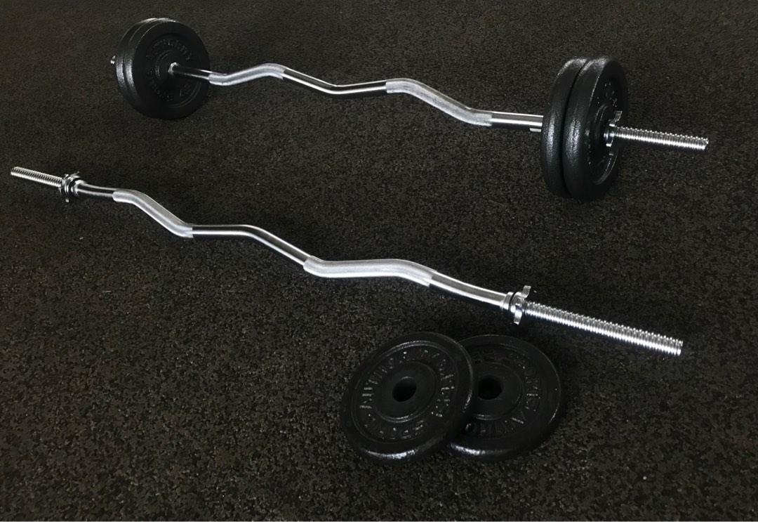 Dumbell set curl bar with four 5lb plates adjustable weights. Sale