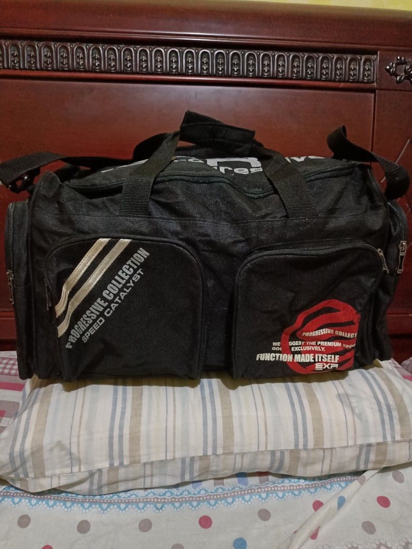 EXR Travel Bag with sling (Category: Cross-body Bags) located in Quezon City. Submitted by krt0912 (Listing ID 1197700850, Image 1). Description: Preloved EXR Travel Bag with sling from Korea ukay bale. size: 21" x 11".