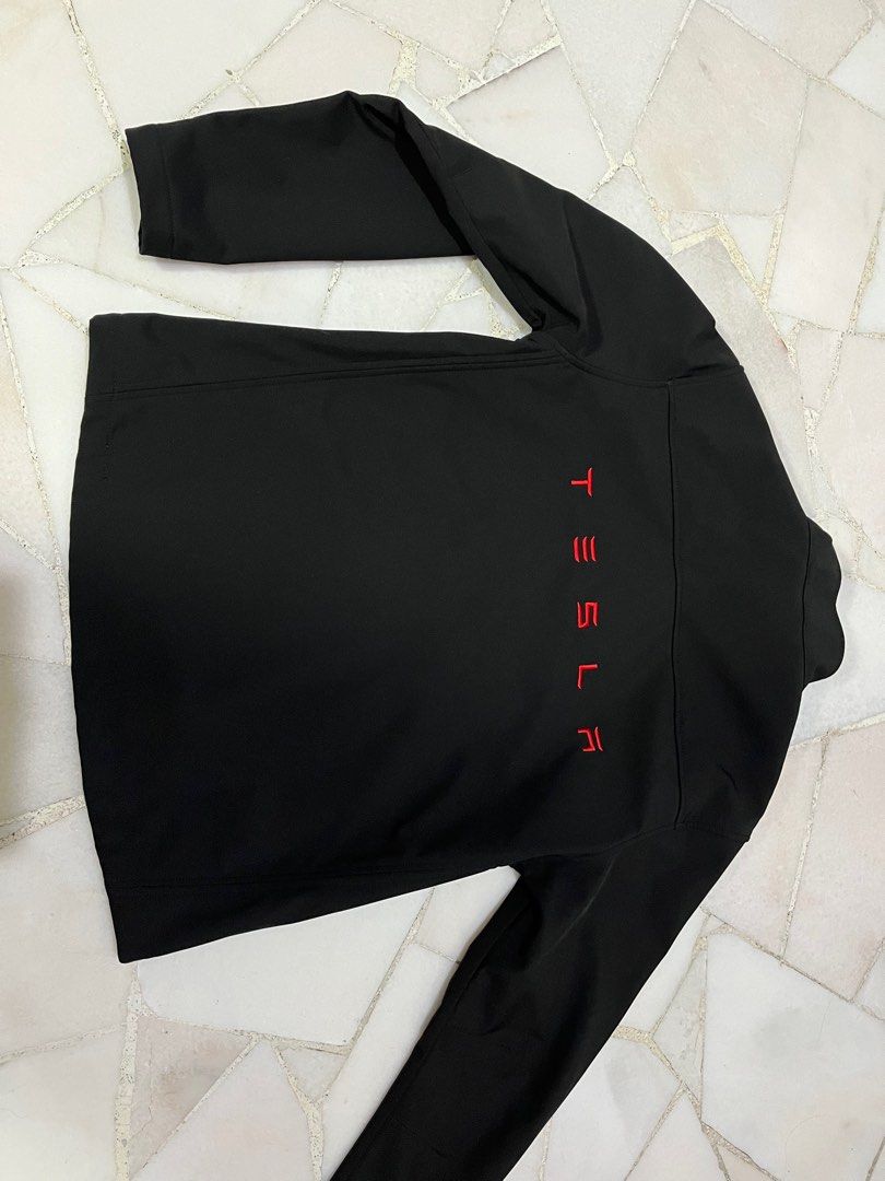 White tesla store jacket