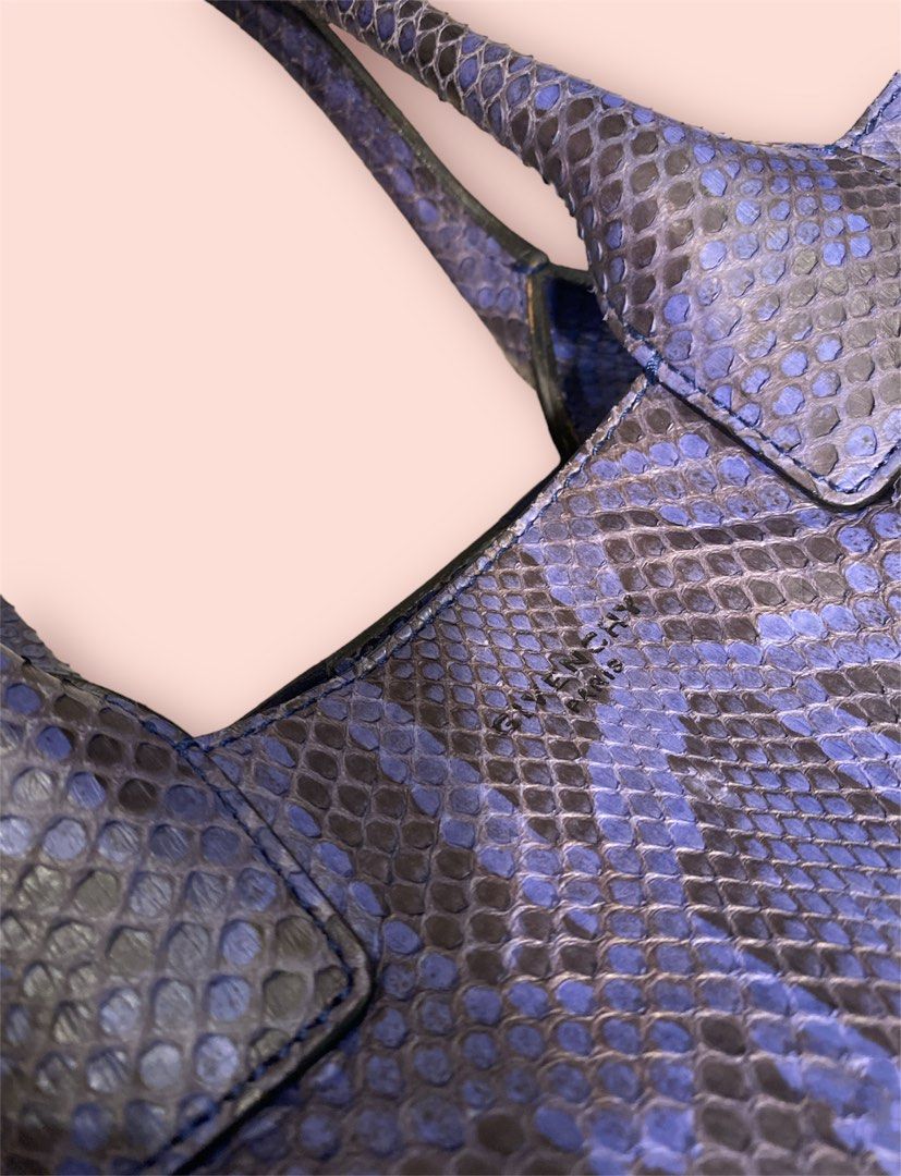 Givenchy Genuine Python Leather (Category: Bags & Wallets) located in Singapore. Submitted by heiulive_ (Listing ID 1197720899, Image 3). Description: 100% Authentic Givenchy Genuine Python Leather $3,888 (no low ballers pls cos this I bought it for $5+k) - Condition: Almost like new - Size: 45cm x 32cm x 14cm, Height with handle : 52cm - No exchanges & Low ballers please. - No COD - Either Free Courier OR Self collect @ Delta Road.