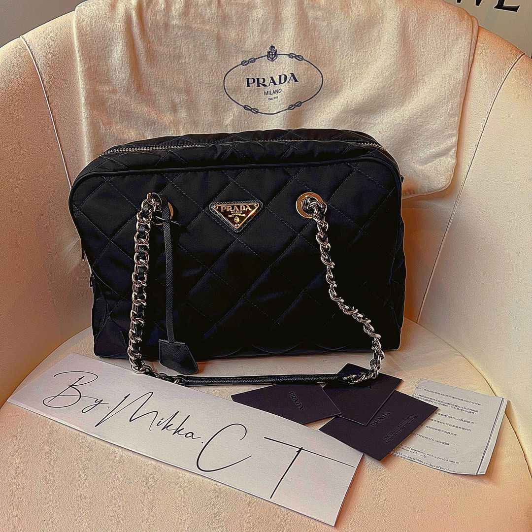 Prada nylon pochette in black, Luxury, Bags & Wallets on Carousell