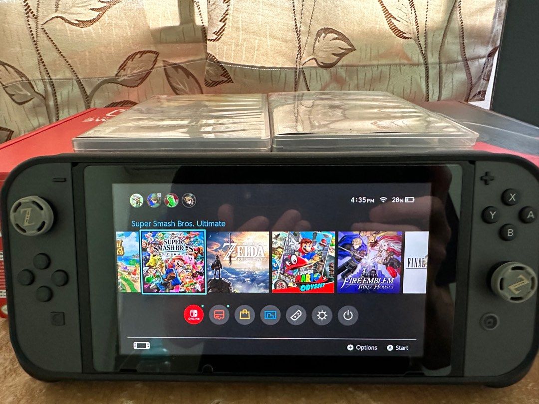 Selling Nintento Switch V2 with 7 Digital Games and 2 disc Video