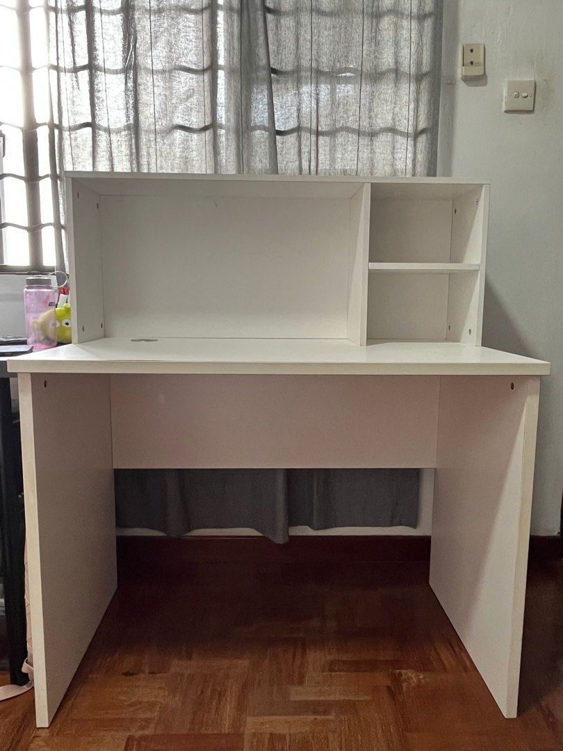 Study Table (Category: Tables & Sets) located in Singapore. Submitted by ecjwwa2dpv (Listing ID 1197705255, Image 1). Description: Lightly used study table Looks as good as new Have 2 compartments that can store books .