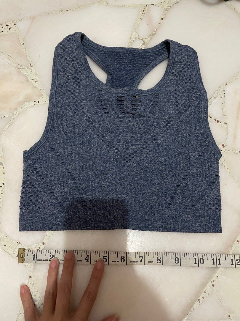 Alo blue crop top (Category: Activewear) located in Singapore. Submitted by dusk_sky (Listing ID 1197928157, Image 1). Description: Worn once In perfect condition See photos for measurements .