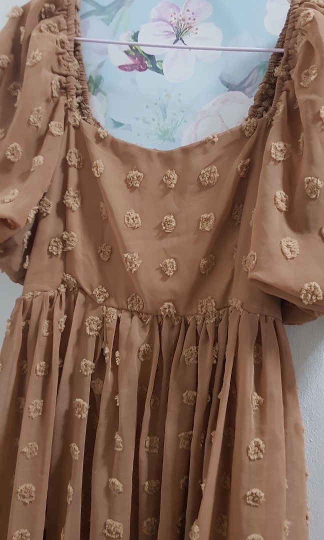 BKK Swiss Dots Dress (Category: Dresses) located in Quezon City. Submitted by anlimorevoni (Listing ID 1197888527, Image 2). Description: BKK Swiss Dots dress, brandnew, tan (color), fully- lined, puff sleeves, smocked at the back, best fits S, M, Semi-Large, gold tag. Measurements: Bust: Up to 34" Waist: Up to 30" Length: 35".