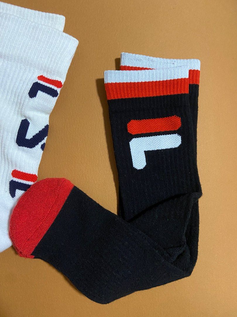 Fila cushioned over the calf socks long socks winter socks Women s Fashion Watches Accessories Socks Tights on Carousell