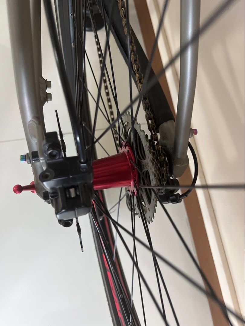 Polygon (Category: Bicycles) located in Singapore. Submitted by dragonworld (Listing ID 1182907487, Image 2). Description: Detail of the bike. 1. Replace wheelset with loud hub 2. KMC gold chain with half hollow 3. Crank reduce to shimano 4. Rotor rplace to red colour with good brand 5. Carbon handle bar 6. Carbon seat post 7. Seat post clamp 8.ring bell 9. Pedal gub type If you buy the bike free bicycle holding rack. Come down test and you will 