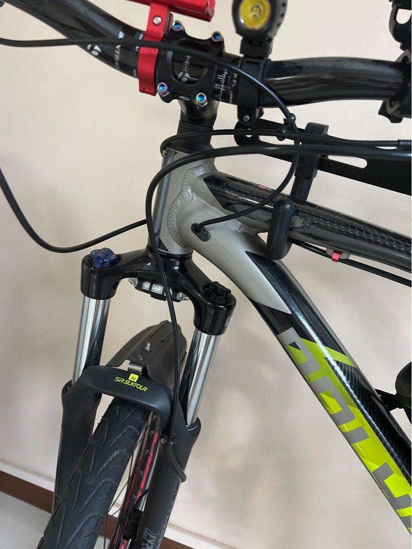 Polygon (Category: Bicycles) located in Singapore. Submitted by dragonworld (Listing ID 1182907487, Image 4). Description: Detail of the bike. 1. Replace wheelset with loud hub 2. KMC gold chain with half hollow 3. Crank reduce to shimano 4. Rotor rplace to red colour with good brand 5. Carbon handle bar 6. Carbon seat post 7. Seat post clamp 8.ring bell 9. Pedal gub type If you buy the bike free bicycle holding rack. Come down test and you will 