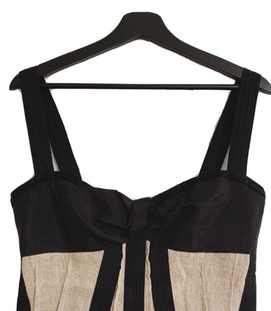 D&G Bow corset top (Category: Luxury Apparel) located in Cebu City. Submitted by dandelionne (Listing ID 1194309665, Image 3). Description: open to offers no lowballing i love this top so im fine with just keeping it Vintage Dolce and Gabbana corset bustier top Perfect condition. Lined inside and sturdy, structured material throughout, but no boning so it’s super comfortable. Zips down the back. Pleated detail and slight peplum swing make it figu