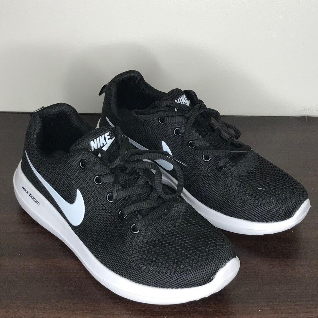 Nike rubber shoes black and white sales