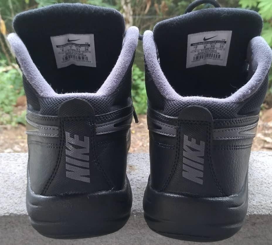 triple black nike boots