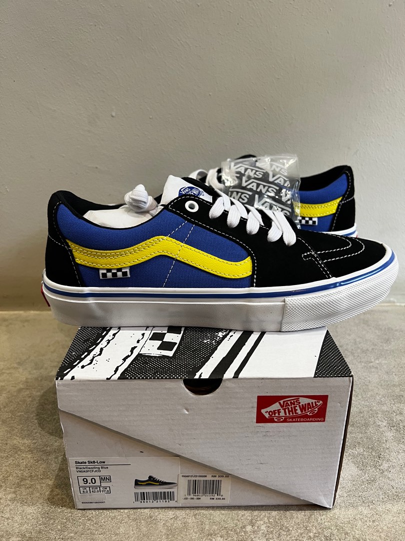 Black and blue low top vans clearance