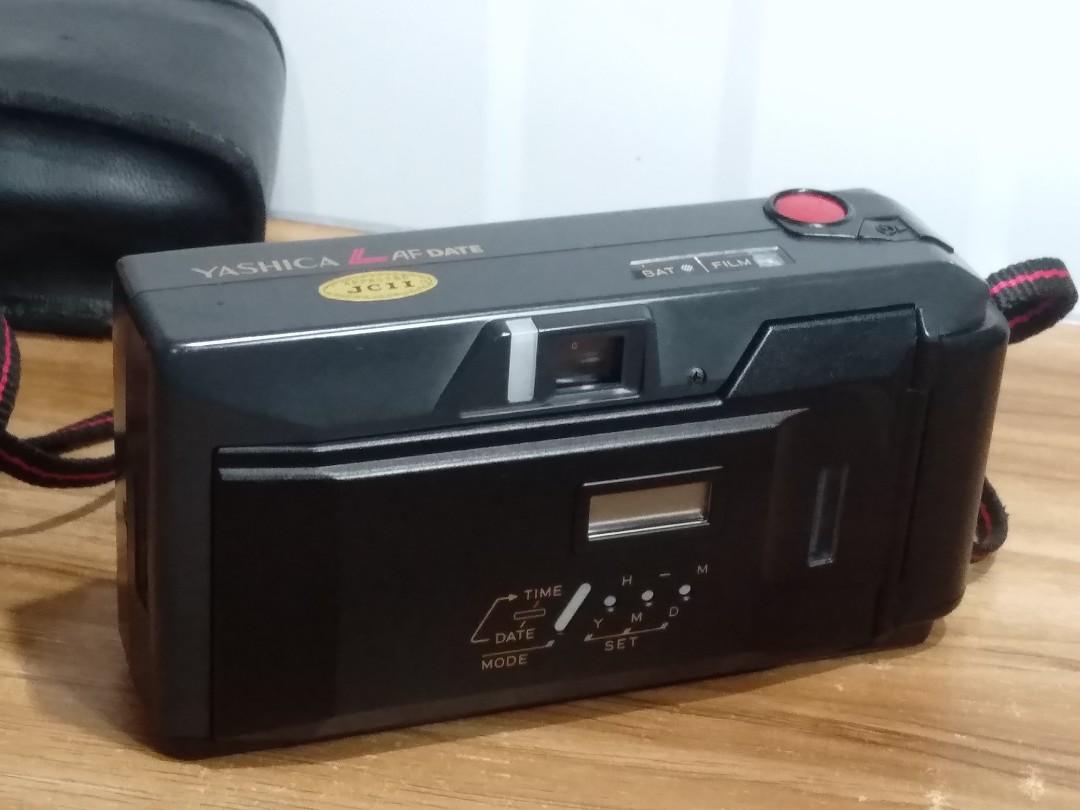 Yashica L-AF film camera (Category: Cameras) located in Las Pinas. Submitted by film101 (Listing ID 1194332413, Image 2). Description: 🎥Yashica L-AF Date film camera with pouch 1986 🎎Imptd purchase -Equipped with 32mmf3.5 prime lens -with date quartz -run by 2CR5 not incl Its a compact with retro look back in the 80s ✔️Condition of camera ✔️Meter working ✔️Optics clean ✔️Aperture snaps ✔️Rewind working ✔️Advance working ✔️Tested with dummy film