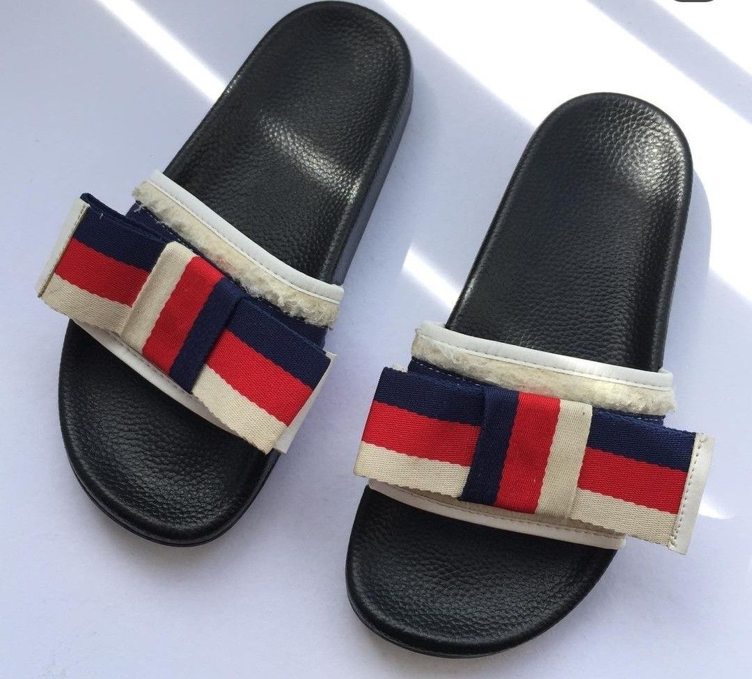 Gucci pursuit outlet bow slides