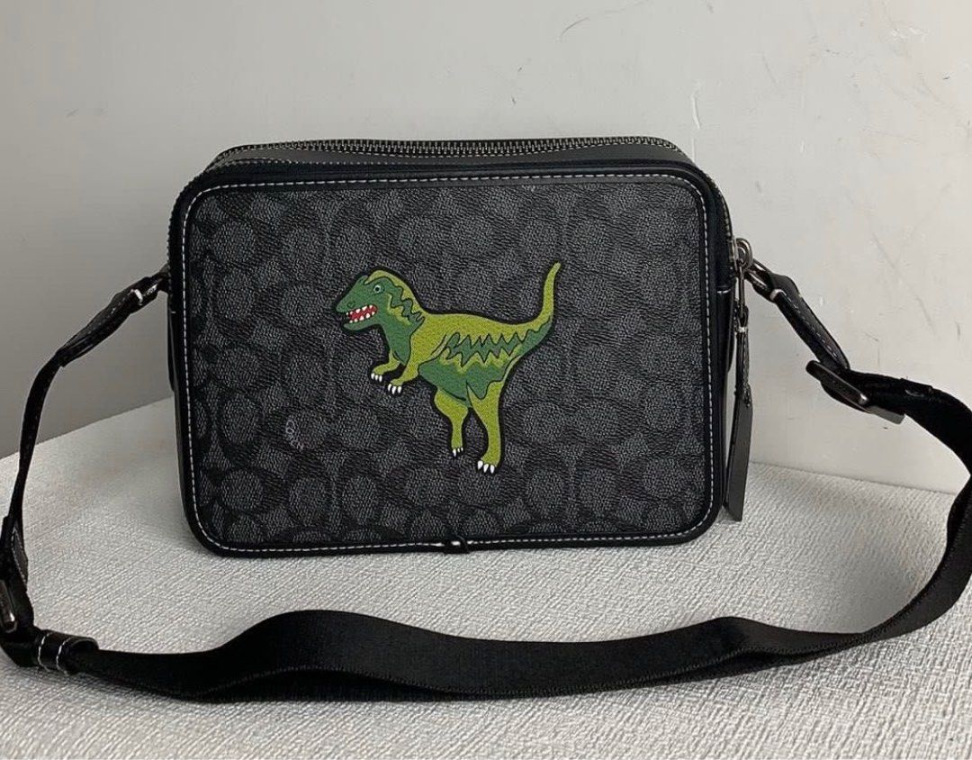 Coach new arrivals wristlet dinosaur