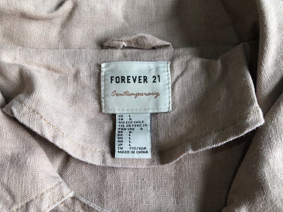 Forever 21 Women’s Jacket (Large) Pre-loved (Category: Coats, Jackets and Outerwear) located in Quezon City. Submitted by nicoleunderscore (Listing ID 1198172355, Image 3). Description: Pre-loved Forever 21 Jacket (Large) Used lightly, still in good condition 💕 The button hole on the left cuff got bigger though (as photographed above), the button is still attached, although it may have to be sewn on to the other side L: 53cm W: 54cm Feel free to