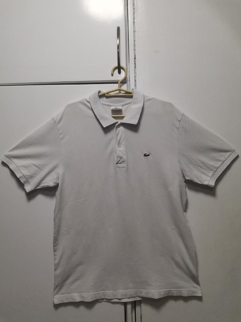 Lacoste White Polo Shirt (Category: Tshirts & Polo Shirts ) located in San Jose. Submitted by dos__ (Listing ID 1198153807, Image 1). Description: Lacoste White Polo Shirt Excellent Condition Color rate: 9/10 Dimensions: 22W x 29L Size 6 on tag No issue Dm for more detailed pics.