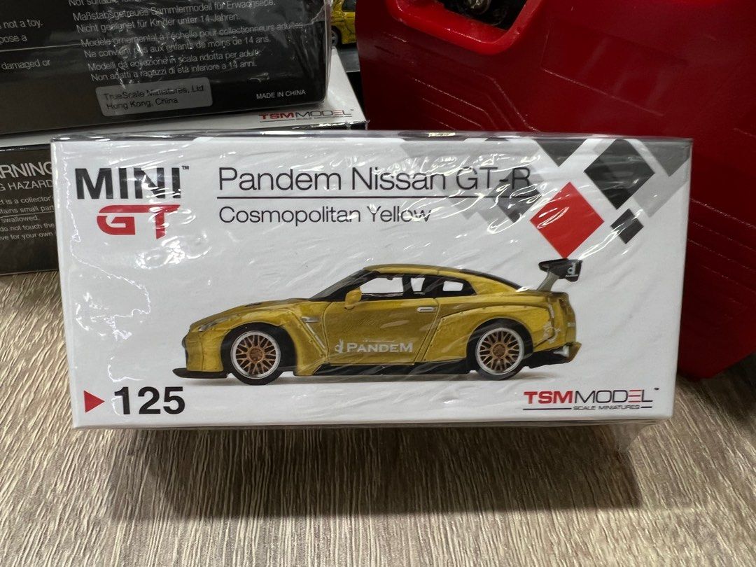 MINIGT 1/64 125 パンデム 日産 GT-R コスモポリタンイエロー MINIGT.com – Welcome to the World of 1:64!
