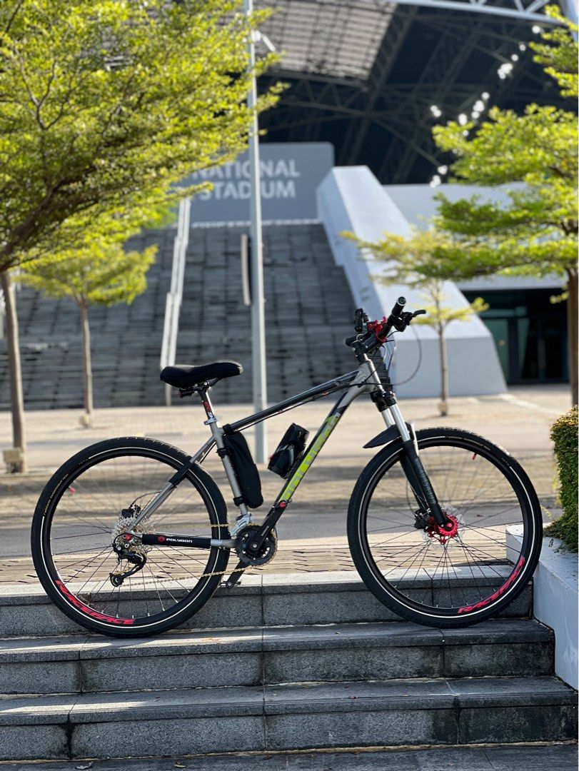 Polygon (Category: Bicycles) located in Singapore. Submitted by dragonworld (Listing ID 1182907487, Image 1). Description: Detail of the bike. 1. Replace wheelset with loud hub 2. KMC gold chain with half hollow 3. Crank reduce to shimano 4. Rotor rplace to red colour with good brand 5. Carbon handle bar 6. Carbon seat post 7. Seat post clamp 8.ring bell 9. Pedal gub type If you buy the bike free bicycle holding rack. Come down test and you will 