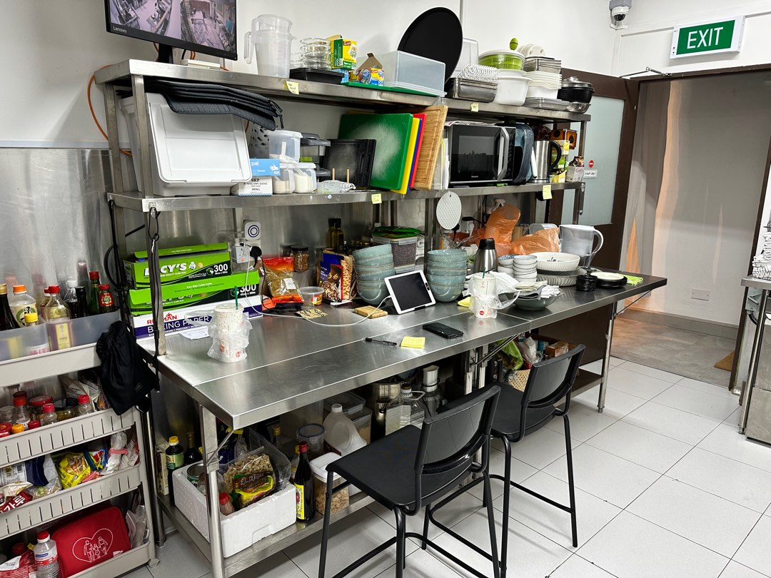 commercial kitchen work table with storage above