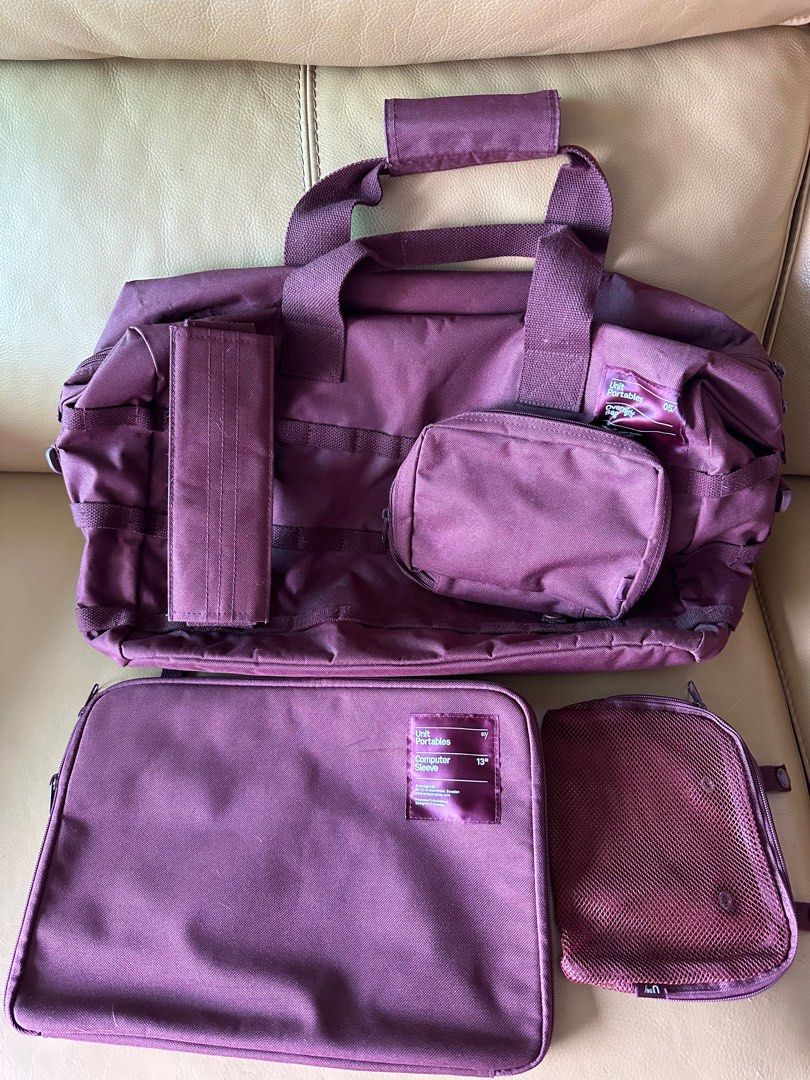 Unit Portables 05 Overnight Bag in burgundy comes with accessories