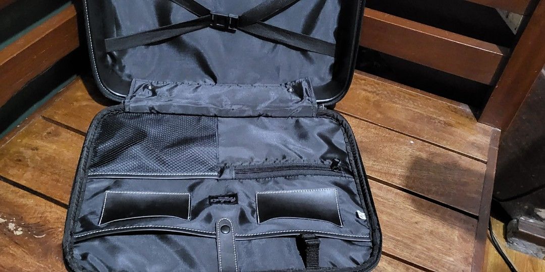 Black Laptop Bag Brief Case (Category: Briefcases) located in Quezon City. Submitted by alexsanbrielle (Listing ID 1198417386, Image 2). Description: Like New Condition. very safe for Laptop and other documents. Has Hard Wrap around case Stand alone Bag..