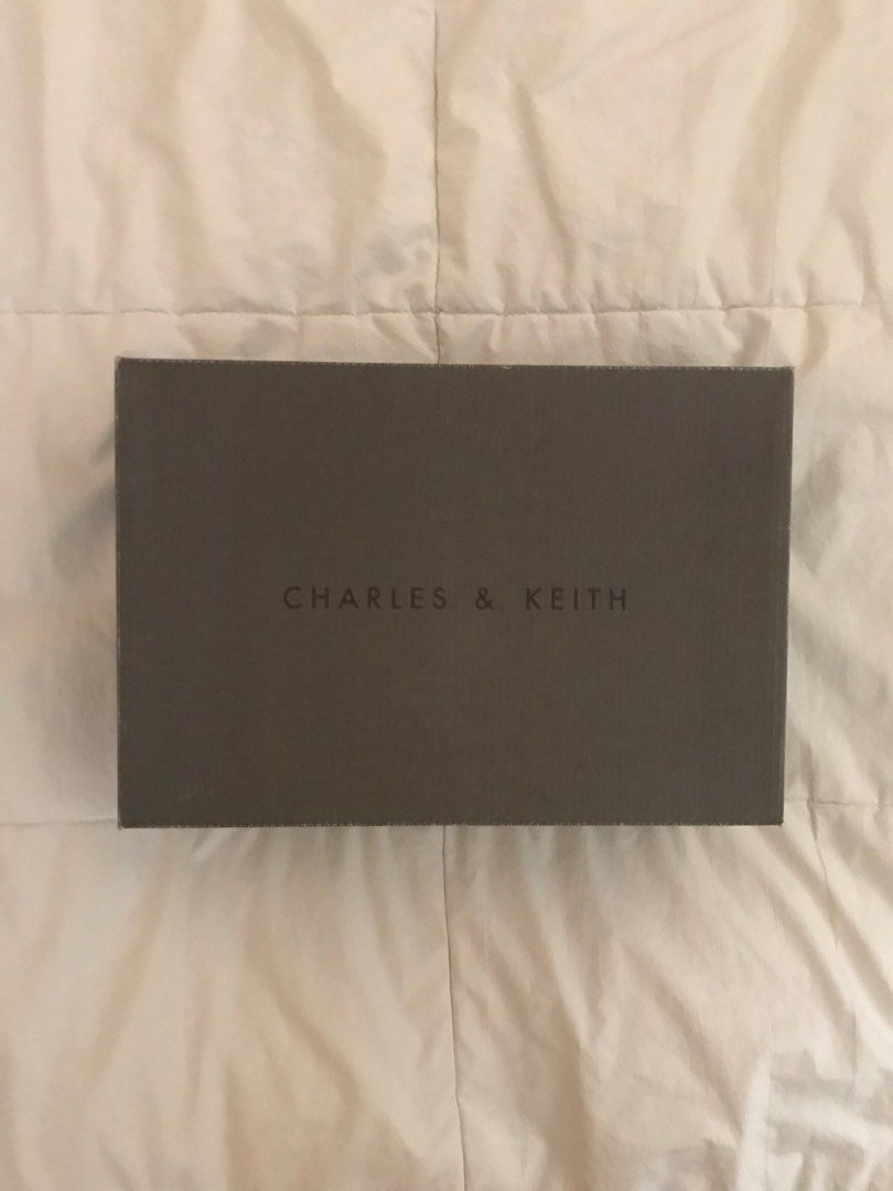 Charles & Keith Pre-Loved Stilettos Heels (Category: Heels) located in Paranaque City. Submitted by jaykeli (Listing ID 1198250545, Image 2). Description: C&K Frayed Fringe Ankle-Strap Heels Material: Faux Suede Size: 36 Color: Black Imported Bought from: Singapore (SG, 2019) Original price: ₱2,500 (SGD $60) Usage: Prom + Formal Occasions Observable Flaws: Mostly minor dirt + discoloration on the sole of the heels. Location: Parañaque City, Metro
