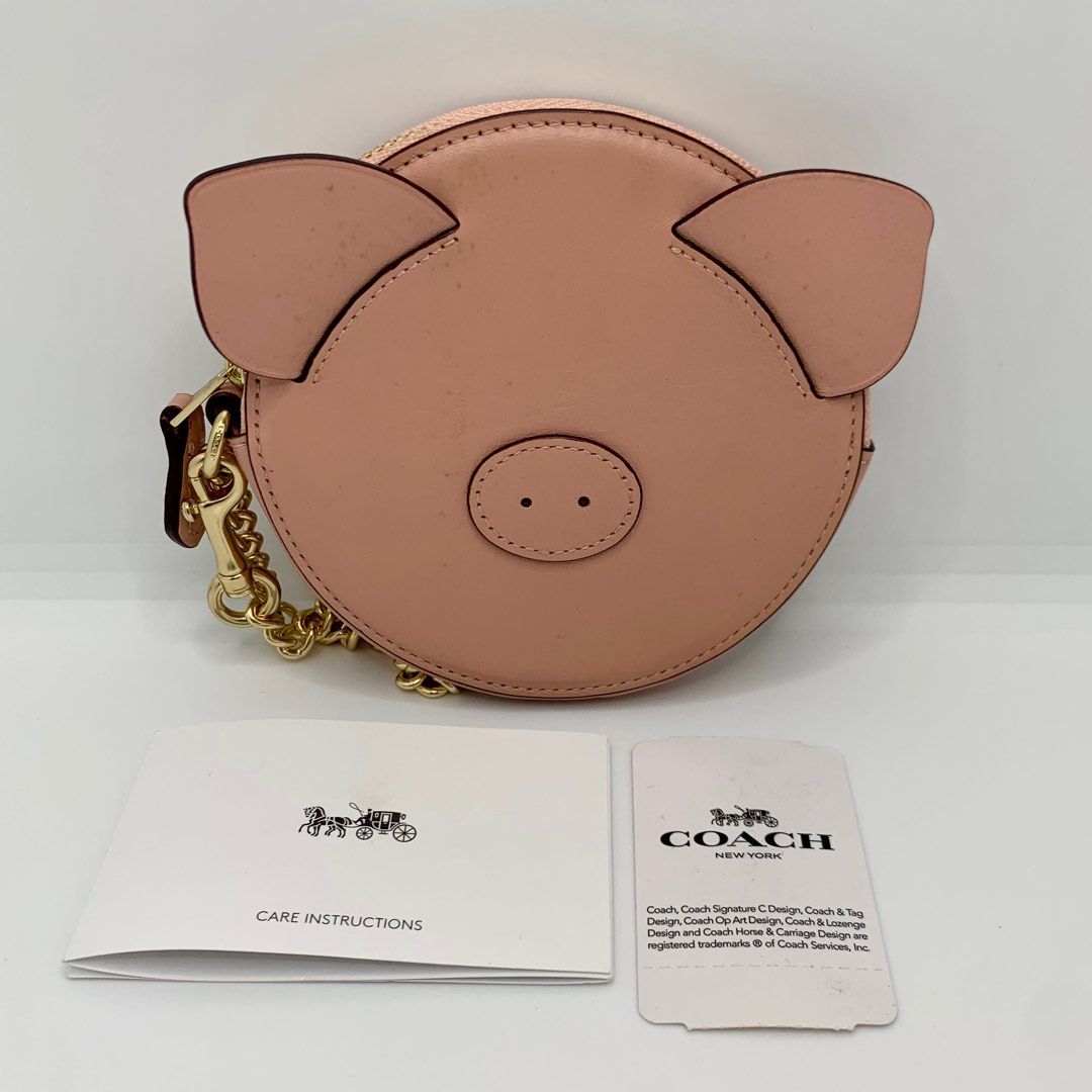 Coach pig coin case 2025