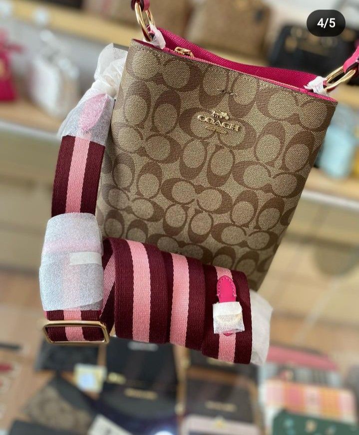 Coach small town bucket in bold pink, Luxury, Bags & Wallets on Carousell